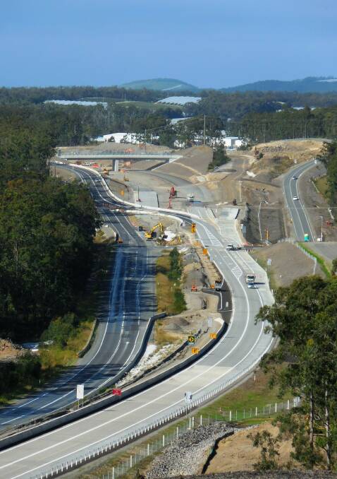 A new section of the Pacific Highway upgrade north of Coffs Harbour opened to motorists on Friday