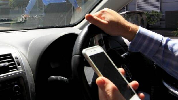 Hang-up and drive – police warn mobile phone users | video, statistics
