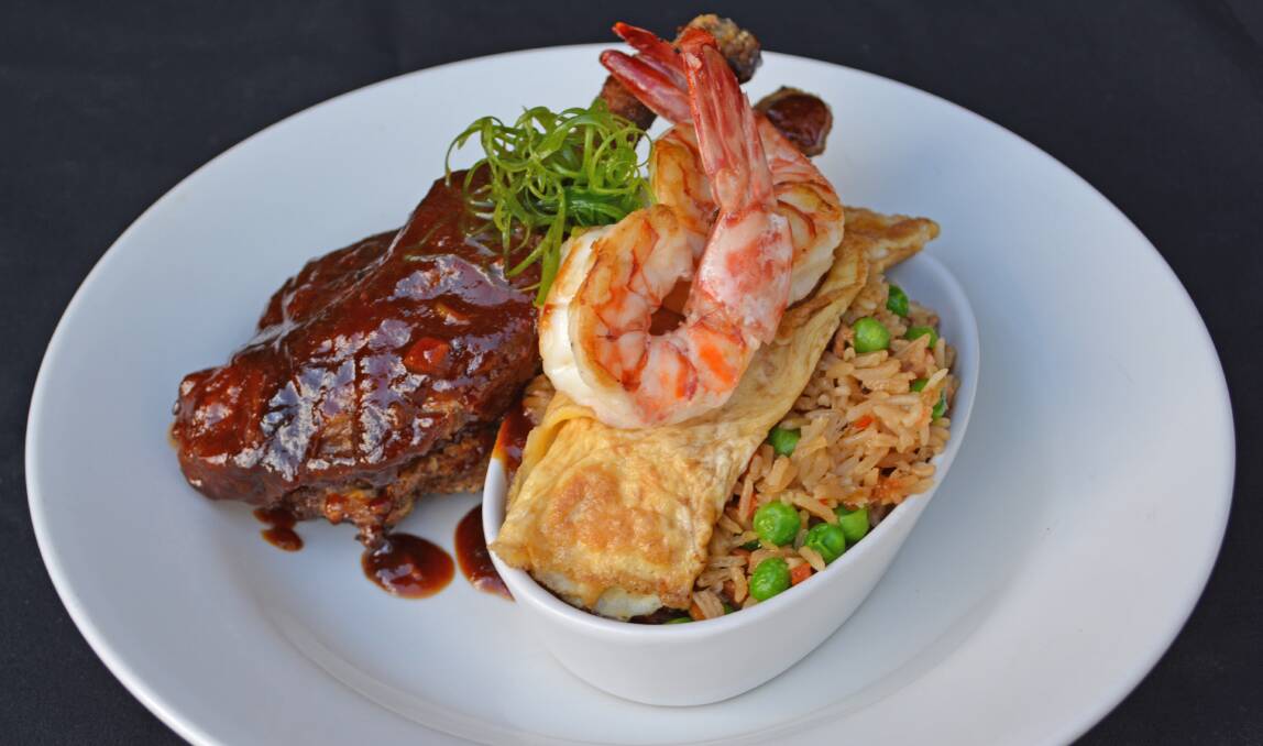 SUPERB FLAVOURS: Heritage Hotel chef Stephen Lock recommends the Crispy Skin Hoisin-Glazed Duck, which is served with a delicious local king prawn fried rice.