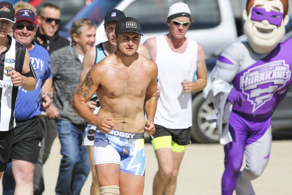 LINE: Brayden Hayes finishing his Hobart to Burnie charity undie run at Wivenhoe on Saturday. 
Picture: Cordell Richardson
