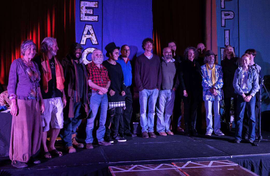 This year's Poetry Slam contestants: Winner Joe Newton is the tall one in middle,standing next to Slam sponsor Matt Spooner (in blue shirt) from Officeworks.