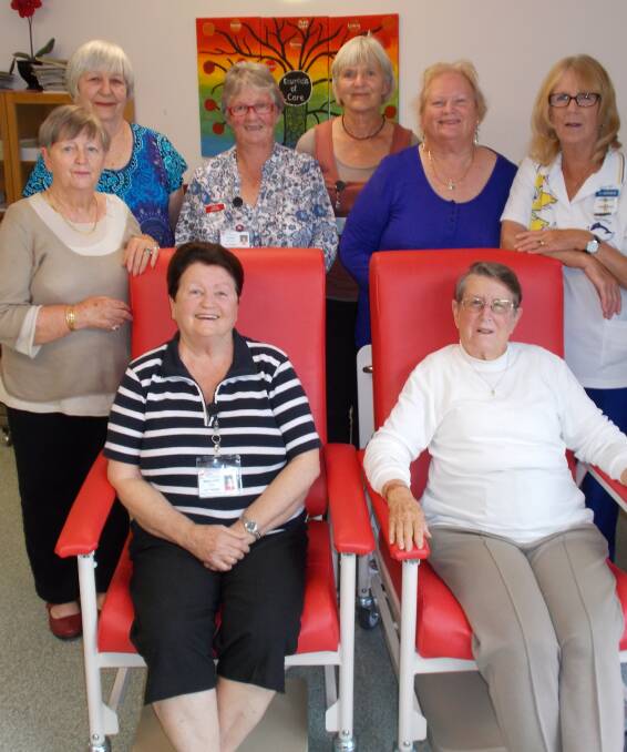 Volunteers Margaret White and Yvonne Thomas (front), Del Slattery, Teresa McKinnon, Jenny Hicks, Shirley Blenman, Jo Bathgate and Margaret Sinkovic with the special patient and visitor chairs donated to Bellinger River District Hospital.
