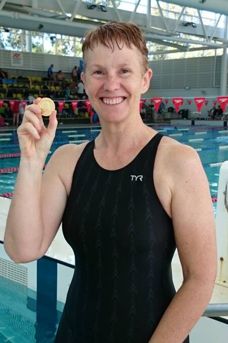 At the NSW Masters Swimming Short Course Championships: Leanne Da Costa and her 200m backstroke gold medal on day one. 