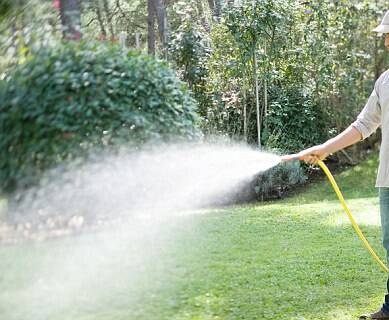 Cut down: Families are being told to reduce their water usage, such as using hoses.