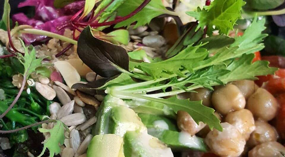 NEW MENU: The Black Bear Cafe serves up the nourishing bowl. Full of mixed local salad greens with pickled veggies, chickpeas, quinoa, tomato,avocado, mixed nuts and seeds finished with a lemon tahini dressing.