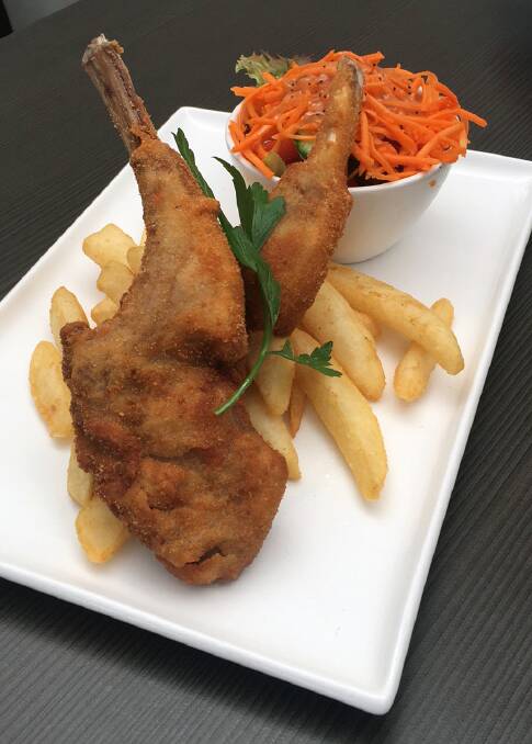 HOUSE SPECIALTY: Enjoy the delicate crumbed lamb cutlets served with a fresh garden salad and crunchy steak fries, or try a panko crumbed chicken schnitzel. 