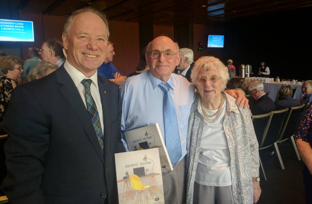 Member for Coffs Harbour Andrew Fraser with Don Langley and his wife, Isabel, at the publication launch in Parliament House on Thursday.