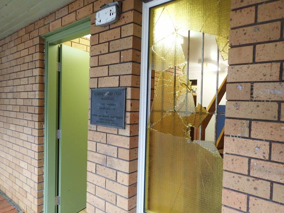 A smashed window at the Urunga Surf Life Saving clubhouse