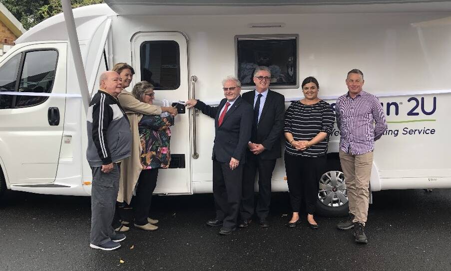 RELIEF CAN NOW COME TO YOU: Cutting the ribbon on the new Tresillion Mobile Van this morning in Macksville