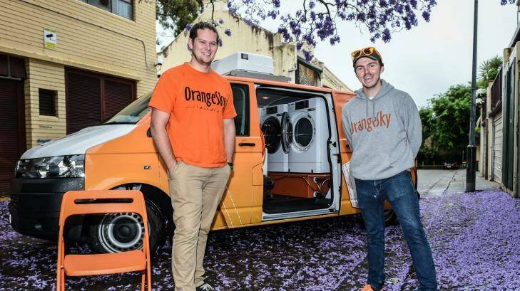 Brisbane friends Lucas Patchett (left) and Nicholas Marchesi are helping the homeless was their clothes via a van fitted out with a washing machine and dryer. Photo: Brendan Esposito