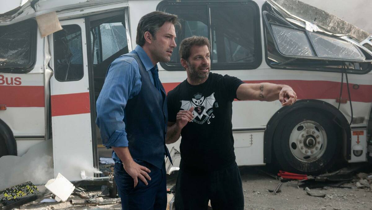 Ben Affleck and director Zack Snyder on set during the filming of Batman v Superman: Dawn of Justice. Photo courtesy collider.com.