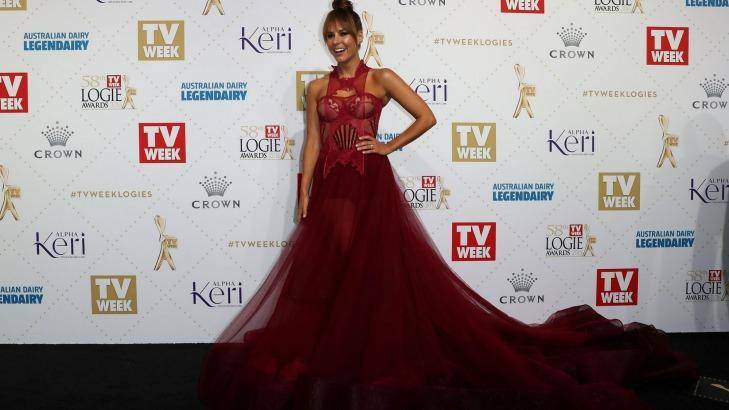 Lauren Phillips wearing a Con Ilio design with a long train, one of the trends on the Logies red carpet. Photo: Robert Cianflone
