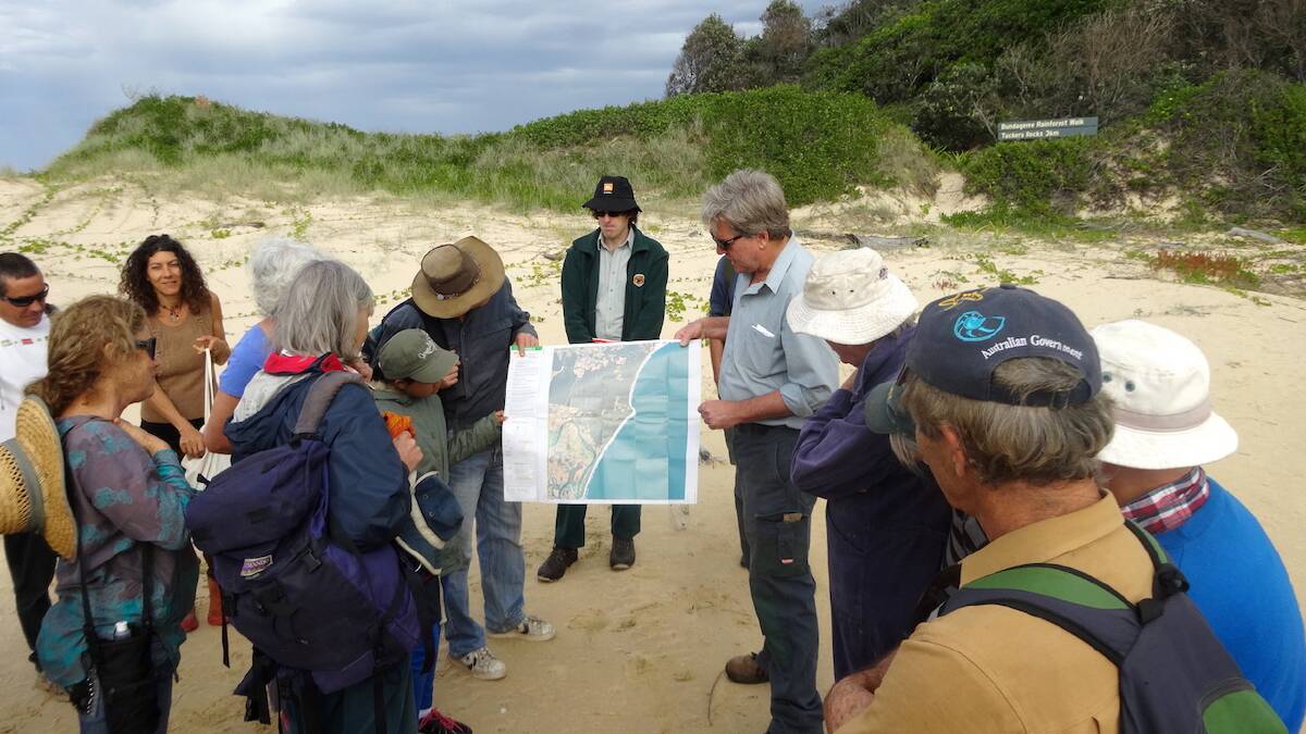 National Parks ranger Martin Smith addresses participants at the mouth of Bundageree Creek.

