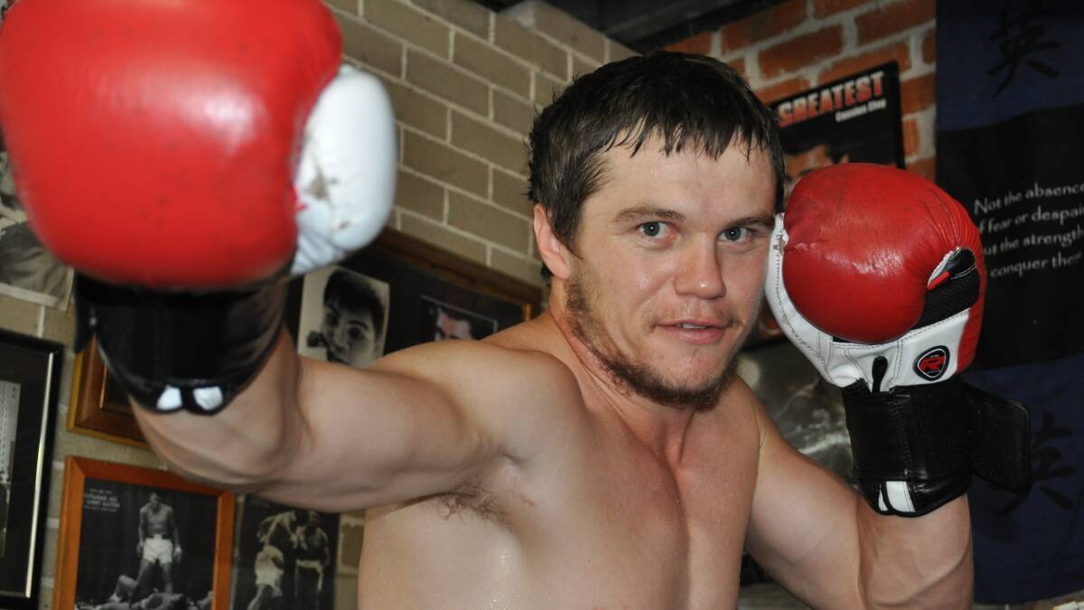 READY FOR ANYTHING: Dorrigo’s Danny Beverley squares up for his third pro fight.
