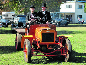 Keith Holmes driving his 1908 Albion leading the parade of vintage cars and floats at the 2012 show.