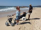 A trial beach wheelchair service has been launched in the Malceay Valley. Picture supplied, Kempsey Shire Council and the Macleay Disability Inclusion Group 