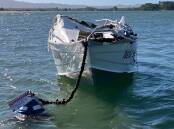 On March 14, two boaters from Newcastle were taken to hospital after their 5.3m vessel was capsized at Macleay River bar near South West Rocks. Picture supplied NSW Marine Rescue.