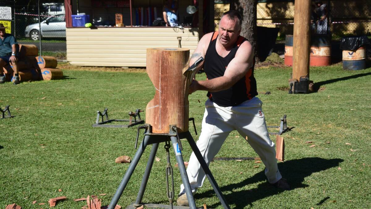 THE CHOP: Craig Fittock from Dorrigo competing in the woodchopping.