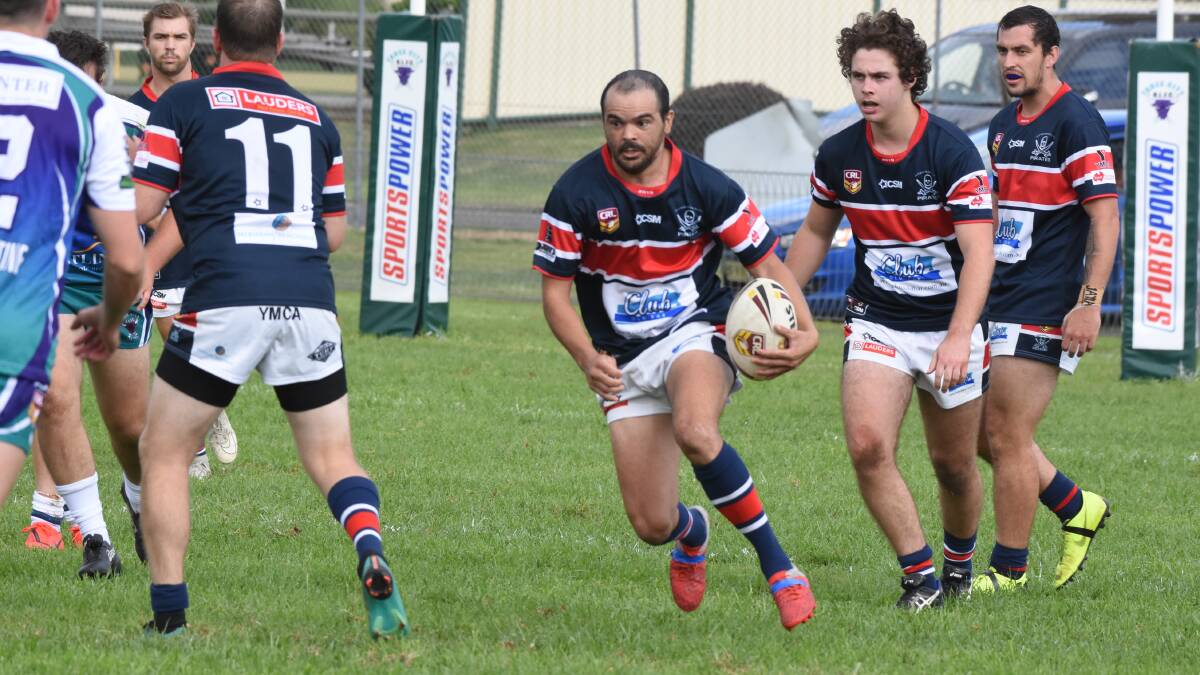Old Bar fullback Scott Bungie races into space during the clash against Taree City.