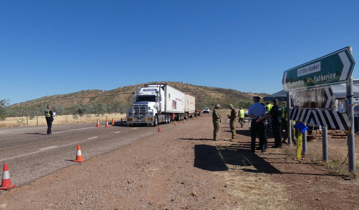 For almost four months already, a detachment of NT and Federal Police, along with Army soldiers have manned isolated checkpoints on the NT-WA borders to successfully keep coronavirus at bay. Pictures: NT Police.