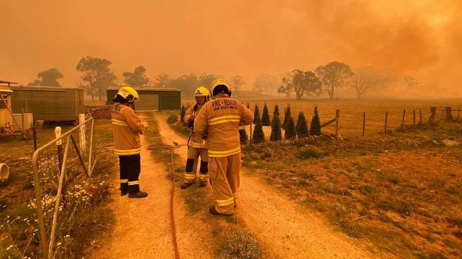 Inferno: Firefighters at the massive Guyra Road fire at Ebor. Photo: Fire and Rescue NSW Armidale
