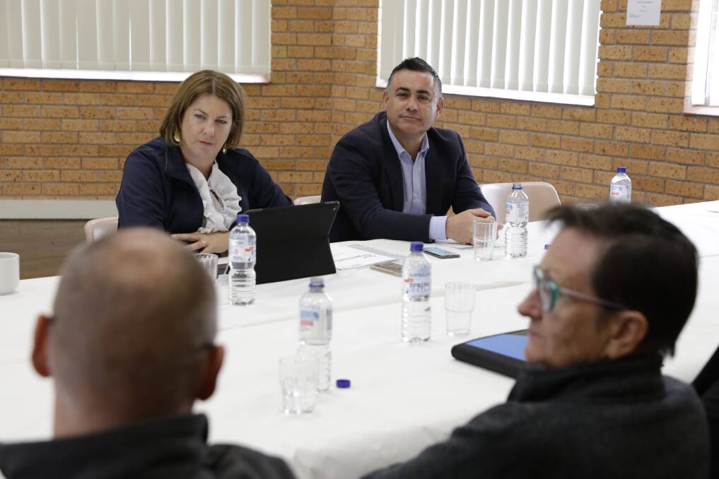 Local member Mel Pavey and Deputy Premier John Barilaro listen to comments from youth services advocates