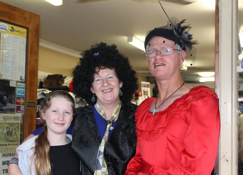 Bellingen's Crazy Day has ended, but not to worry there's a revamped event on the cards for next year: Modena, Sharon and Chris are looking great and loving the chance to dress-up. Image: Prue Burnet.