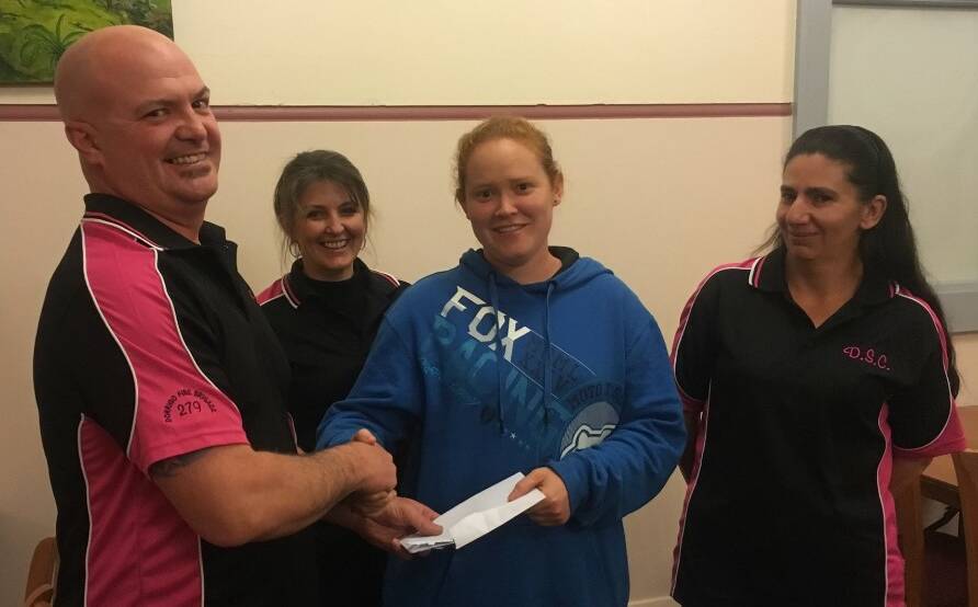 Members of the Dorrigo Swimming Club hands over a cheque to motocross star: Dave Dickings, Korina Colburn, Casey Billings, Dorrigo Swimming Club president Tracy McIlwain.