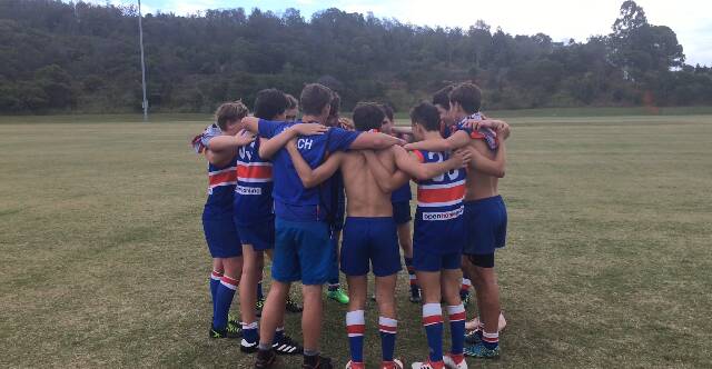 Under 15s in a huddle