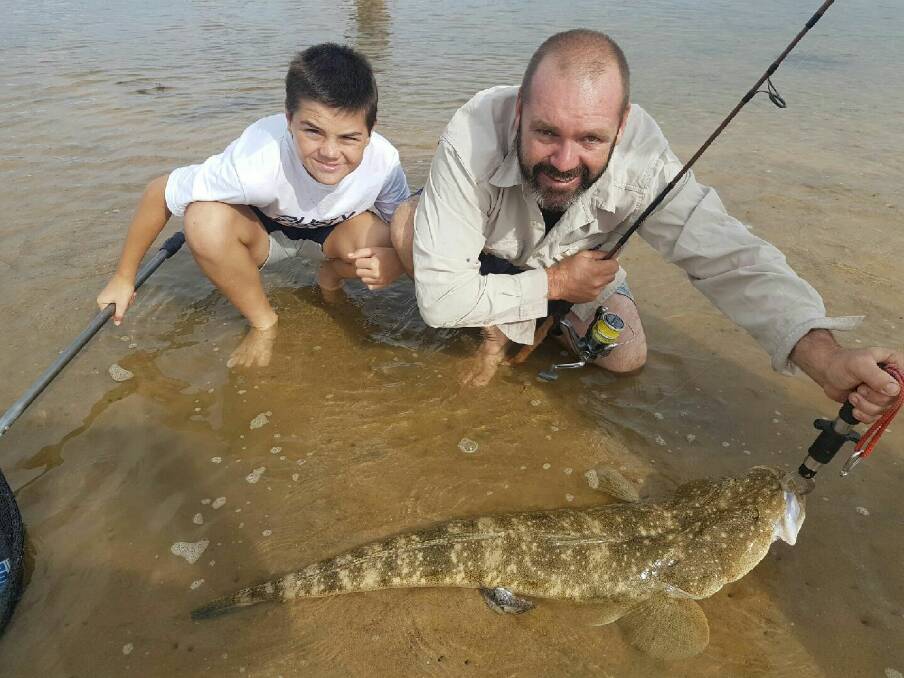 A spectacular 97cm Dusky Flathead caught and released by Stuart Murray and Zac Thick at Urunga over Easter