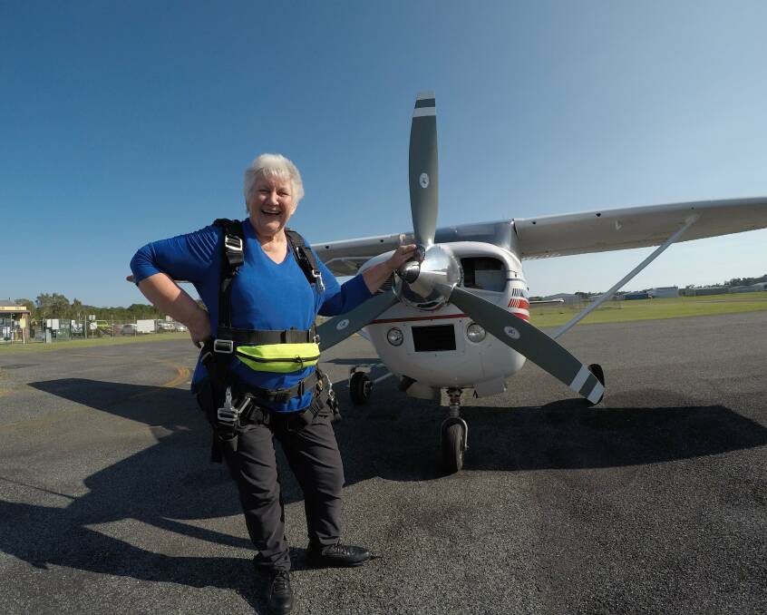 Jan Hogan at Coffs airport with the plane she's about to jump out of