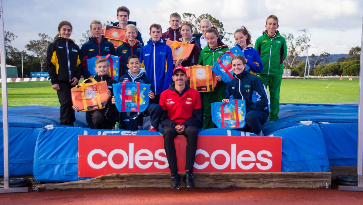 Olympian Brandon Starc and young athletes with the Coles Community Bags