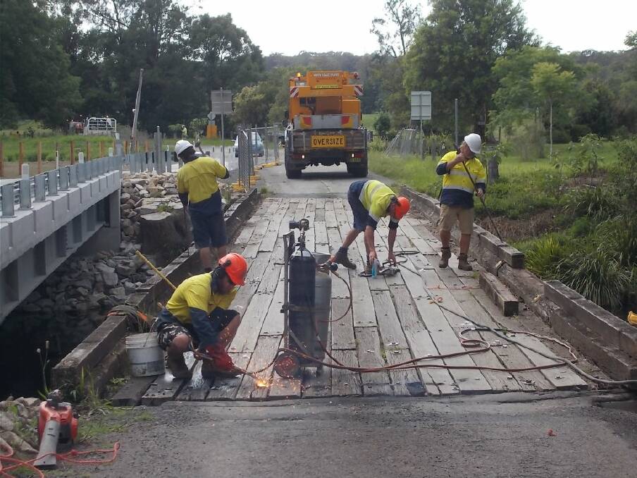 Old timber bridge being dismantled