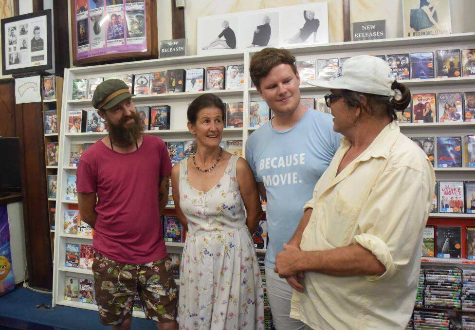 Video shop owners Pamela Whitehead and Edward Bourke (centre) with customers Michael Morgan (left) and Andrew Stockley (right).