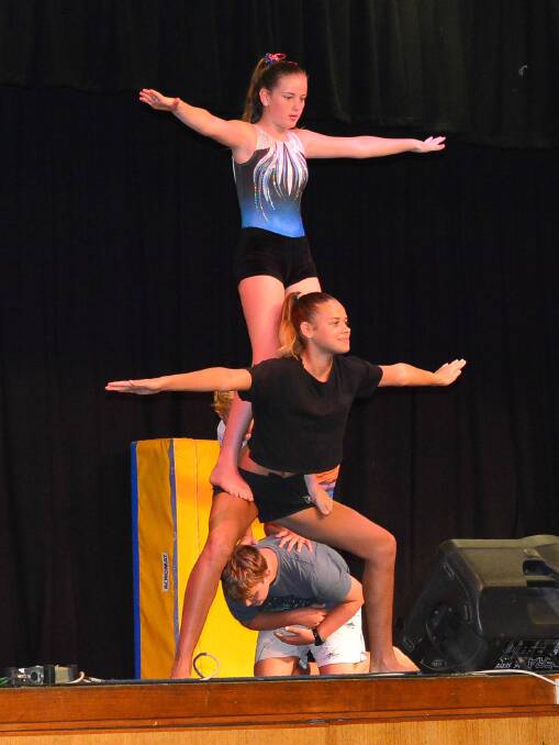 Codi (centre) on stage for 2019 Camp Circus performance