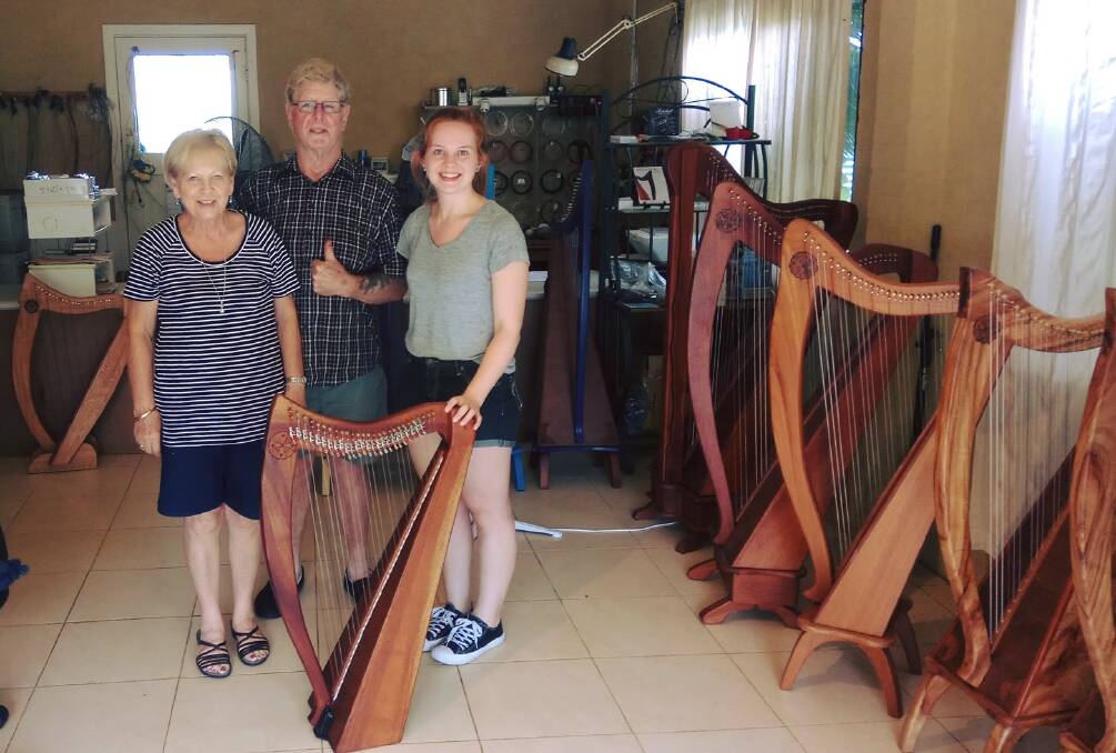 Christine and Denny Warner with customer Susannah Fletcher and a therapy harp