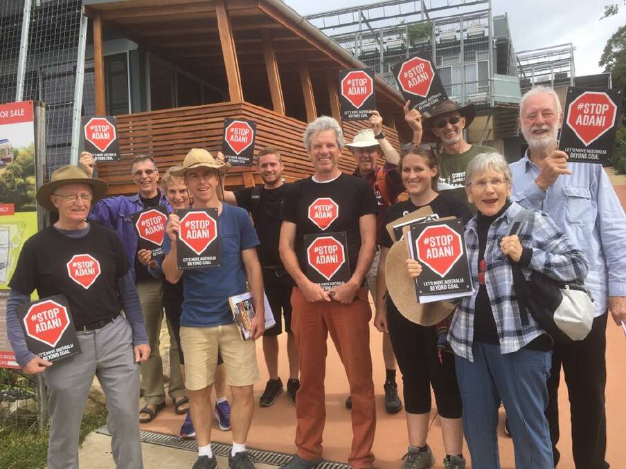 Members of Coffs Coast Climate Action Group doorknocking in Coffs Harbour about the Adani coal mine