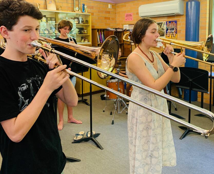 Jazz Band trombonists James Loebel and Rosie Stephen in rehearsal for the concert