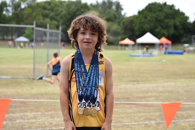 Charlie Phillips U8 Boys with his four gold medals