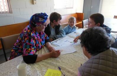 CWA members helping Urunga school students with International Day project on Morocco