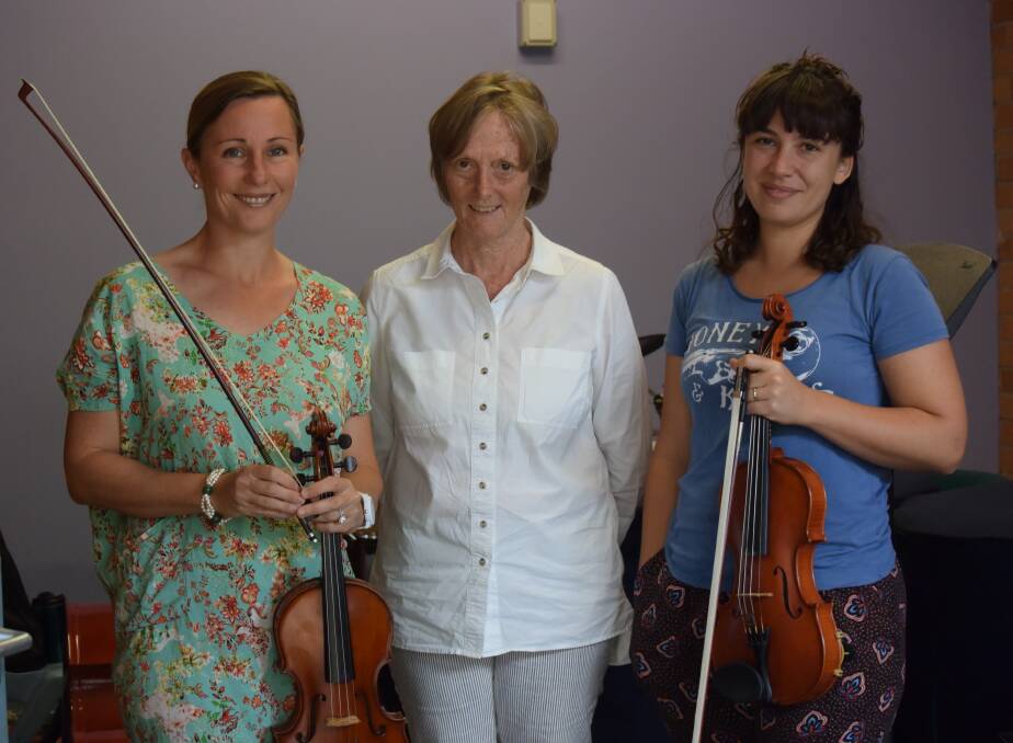 Violinist Amber Davis, BYO conductor Ann Phelan and strings tutor Jacqui Gill