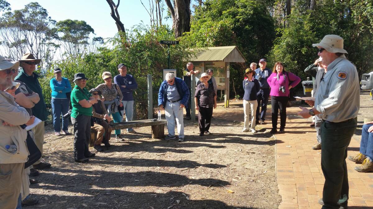 Regional Advisory Committee members from across the state discuss park management issues whilst on a site inspection at Pebbly Beach hosted by Dave Cunningham Senior Ranger South Coast during the October 2017 biennial RAC Conference held in Murramarang National Park.