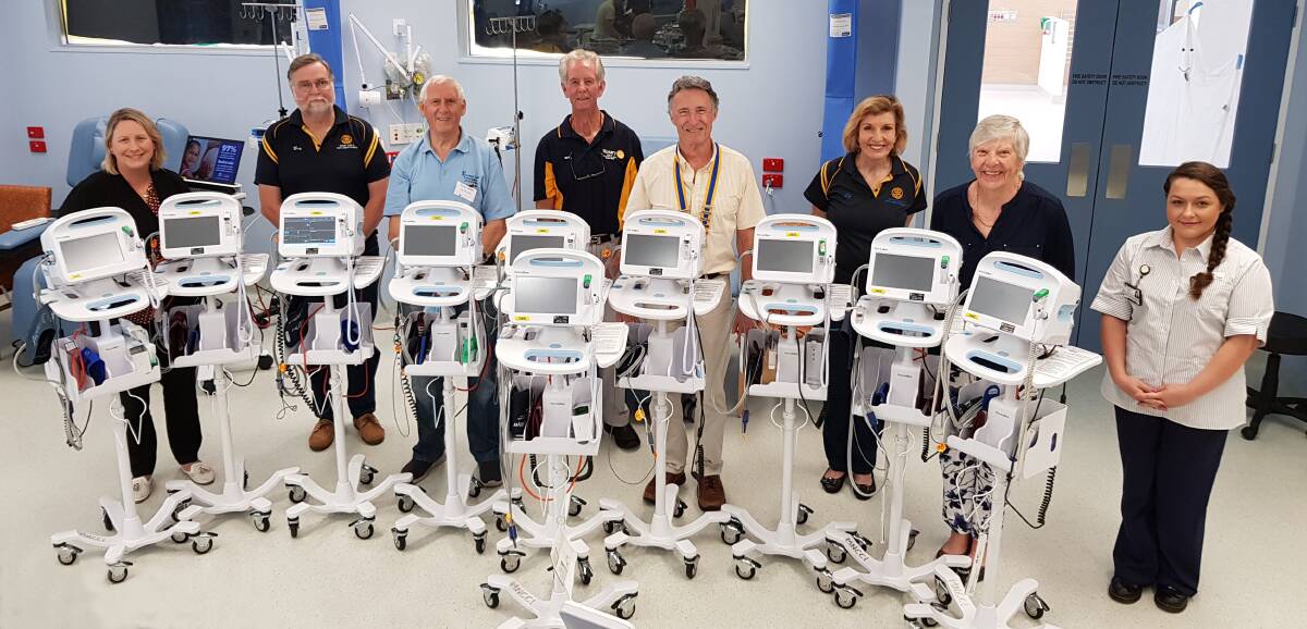 MNCCI Nursing and Service Delivery Manager Jill Harrington and Nurse Unit Manager Amelia Bolt with the 10 vital signs monitors donated by the community. Representing the donors are Gary Hutchinson from Rotary Club of Coffs Harbour Daybreak, Tony Lawlor from Coffs Harbour Prostate Cancer Support Group, Mike Blewitt of Coffs City Rotary, Mark Spencer and Liz Donnan of Daybreak Rotary and Rosemary Hepworth of the Rotary Club of Coffs Harbour South.