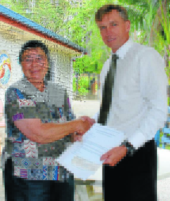 Barbara Moore being thanked by MNC Local Health District CEO Stewart Dowrick in 2014 for her contribution as a "long-term agitator" for Bellingen Hospital