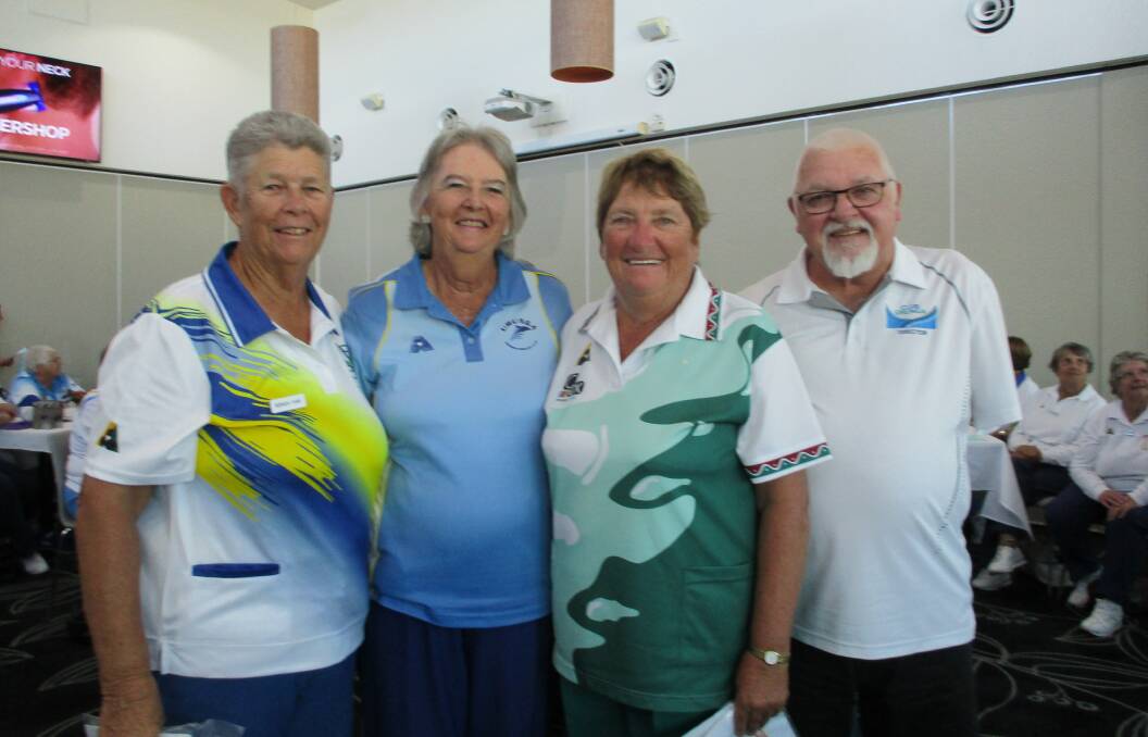 Excited winners of the 29th Camellia Carnival Brenda Fane (Park Beach), Kath McPhail (Urunga), Shirley Willis (Coffs Ex) with Club Urunga President Garry Carter.