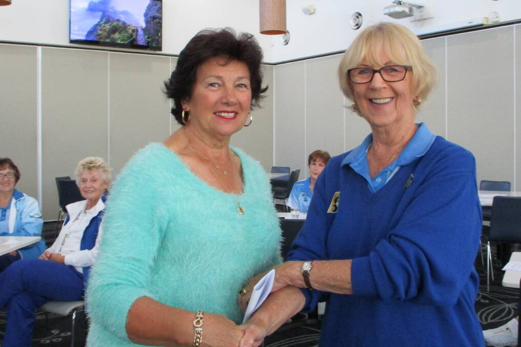 Johanna Bathgate (Right), President of Urunga Women's Bowling Club, presenting a cheque for $500 from UWBC to Bev Cloake (Left) representing Macksville Palliative Community Care