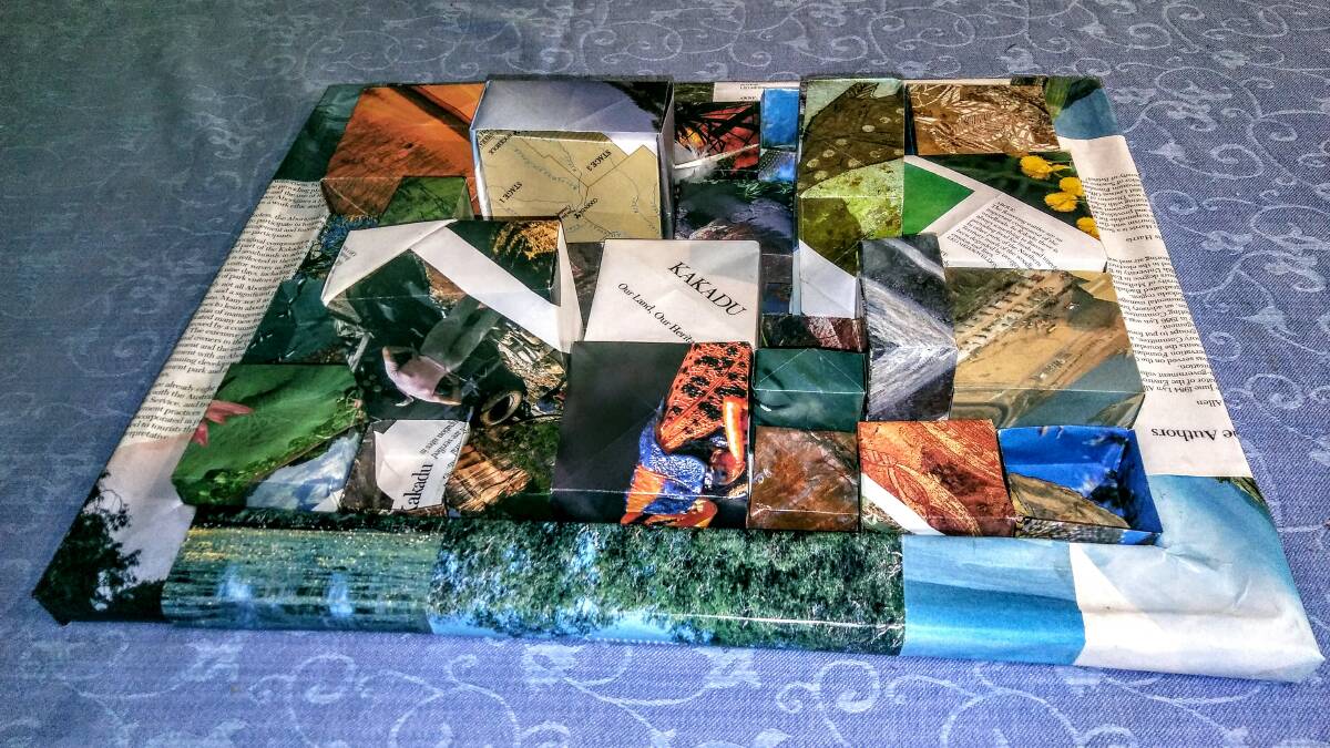 This 3D collage, Kakadu, was made from origami boxes and used an entire book
