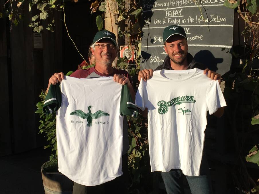 Charles Wolfson presenting team t-shirts to sponsor Rain Foran from the Bellingen Brewery