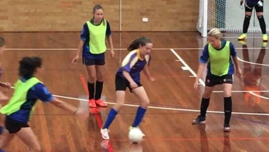 Sophie Boyd on the ball against Camden Haven
