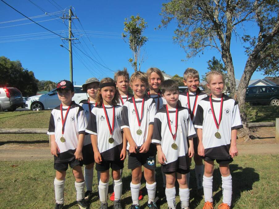 Bellingen Bats U9s team after their gala day last year. Rio is in the front row, second from the left